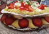 Dacquoise alle mandorle con crema chantilly e fragole torta Dacquoise alle mandorle